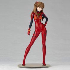 a figurine is shown in red and black with her hands on her hips