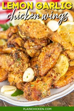 lemon garlic chicken wings on a white plate with text overlay that reads, lemon garlic chicken wings