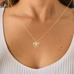 Introducing our enchanting Personalized Initial Heart Necklace 💖✨ Embrace the beauty of individuality with our exquisite Personalized Initial Heart Necklace - a perfect blend of elegance and personal touch! 💖 Cherished Customization: Make a statement with this heartwarming necklace by adding your or a loved one's initial. This personalized touch transforms the piece into a unique and meaningful accessory that captures the essence of your identity or a special connection. ✨ Timeless Elegance: Crafted with precision and attention to detail, the delicate heart pendant exudes timeless elegance. The dainty design makes it a versatile accessory that seamlessly transitions from day to night, adding a touch of sophistication to any outfit. 💖 Quality Craftsmanship: Our artisans meticulously crea Personalized Heart Necklace As Gift For Her, Personalized Open Heart Jewelry With Initials, Heart-shaped Initial Necklaces For Anniversary, Sterling Silver Heart Initial Pendant For Mother's Day, Open Heart Birthstone Charm Necklace, Mother's Day Sterling Silver Heart Necklace With Initial Pendant, Sterling Silver Heart Necklace With Initials, Anniversary Heart Necklaces With Initials, Heart Cut Jewelry With Initials For Valentine's Day