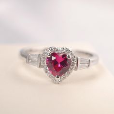 All HANDMADE ITEMS SHIP IN APPROX 8 DAYS Main Stone: Lab created ruby Main Stone Size: Heart cut 6 mm x 6mm Main Stone Weight: 1.16 carat Side Stone: CZs Height From The Ring Setting Bottom(to gemstone top): about 5.25 mm Width of Ring band Measure: gradually varied,about 2.08 to 2.31 mm Material: .925 Sterling Silver/14K White Gold/14K Yellow Gold/14k Rose Gold Engraved: Available For FreeNo more than 13 letters) Customized:Of course! Tell me what you want Includes With Order: All of my store i Fine Jewelry Lab-created Ruby Ring For Valentine's Day, Valentine's Day Lab-created Ruby Fine Jewelry Ring, Valentine's Day Fine Jewelry Lab-created Ruby Ring, Lab-created Ruby Heart Cut Promise Ring, Heart Cut Lab-created Ruby Promise Ring, Lab-created Ruby Ring For Valentine's Day, Valentine's Day Ruby Ring Fine Jewelry, Valentine's Day Anniversary Ruby Ring, Red Diamond Heart Ring Fine Jewelry