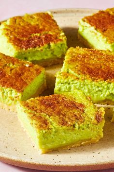 several pieces of green cake on a plate