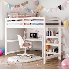 a white loft bed sitting next to a desk