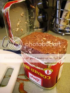 an open can of food sitting on top of a counter