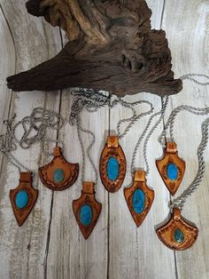 Check out this item in my Etsy shop https://www.etsy.com/listing/1386833057/arizona-turquoise-inlay-leather Western Style Hand-tooled Leather Jewelry, Western Hand-tooled Leather Jewelry, Southwestern Turquoise Inlay Pendant Necklace, Western-style Turquoise Necklace With Large Pendant As Gift, Leather Necklaces, Western Turquoise, Leather Pendant, Leather Accessories Handmade, Diy Slippers