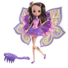 the doll is wearing a purple dress and holding a hairbrush in her hand,