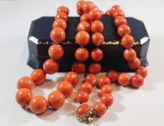 -Antique 14k Gold Natural Orange Coral Necklace 99.1g -Total length: 26.5 in -Bead size: 9 mm ~ 13 mm -Total weight: 99.1 g -Marked 14k Yellow Gold Necklace With Box Clasp Gift, Antique Round Jewelry With High Luster, Antique Round High Luster Jewelry, Antique High Luster Round Jewelry, Traditional Single Strand Formal Jewelry, Classic Necklace With Box Clasp For Gift, Classic Formal Necklace With Box Clasp, Orange Coral, Coral Necklace