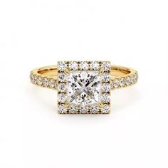 a yellow gold engagement ring with a princess cut diamond surrounded by pave diamonds