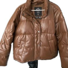 Quilted Leather Outerwear For Fall, Fall Quilted Leather Outerwear, Casual Long Sleeve Puffer Leather Jacket, Leather Outerwear For Outdoor, Faux Leather Outerwear For Winter, Casual Leather Puffer Jacket For Cold Weather, Leather Outerwear For Cold Weather, Faux Leather Outerwear For Cold Winter Weather, Casual Faux Leather Winter Outerwear