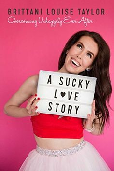 a woman in a red and white dress holding up a sign that says, a sucky love story