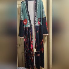 Beautiful Maxie Duster Jacket. Size M. Light Weight Velvet. Brand Is Urisme. New Never Worn. Gorgeous Designs On Both Front And Back. Handmade And Unique! Duster Jacket, Cell Phone Holster, Phone Holster, Walker Boots, Fit N Flare Dress, Gorgeous Design, Rain And Snow Boots, Boot Sandals, Kimonos