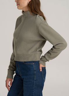 The Half-Zip Sweatshirt for Tall Women Cozy Meets Cool Styling Elevate your casual look with our Wearever 2.0 Half-Zip Cropped Sweatshirt for tall women. This fleece half-zip sweatshirt combines the warmth you need with the style you crave. Featuring a fashionable half zip and a ribbed hem to keep things chic and snug, this cropped women's tall sweatshirt is your new go-to for those chill vibes days. Long sleeves and a relaxed fit ensure you stay comfortable and covered in all the right places.• Versatile Relaxed Fit Half-zip Top, Sporty Outdoor Top With Ribbed Cuffs, Sporty Tops With Ribbed Cuffs For Outdoor, Green Half-zip Cotton Top, Green Cotton Half-zip Top, Versatile Fall Outdoor Tops, Solid Tops For Outdoor Activities In Fall, Athleisure Tops With Ribbed Cuffs For Outdoor, Solid Tops For Outdoor Fall Activities