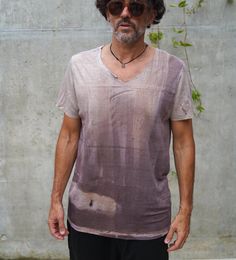 Naturally dyed light purple and beige abstract short sleeve distressed top. Asymmetrical collar. Raw edge sleeves. Fabric is hand dyed using organic plant matter. Each piece is dyed individually and no two can ever be the same. Size: L  Measurements: Chest: 45" (116 cm)  Waist: 45" (114 cm)  Sleeve: 9" (23 cm)  Shoulders: 18" (46 cm)  Length: 31" (78 cm)  One of the kind top! #386 Distressed Brown Summer Tops, Casual Natural Dye T-shirt For Summer, Hand Dyed Faded Tops For Summer, Summer Acid Wash T-shirt With Natural Dye, Summer Hand Dyed Faded Tops, Hand Painted Linen, Asymmetrical Collar, Distressed Top, Collar T Shirt