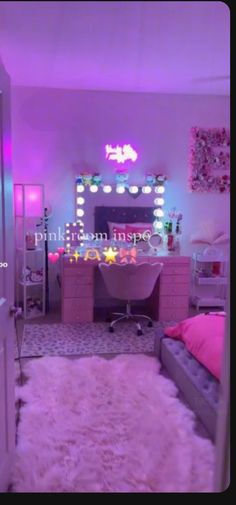 a bedroom with purple lights and a pink rug