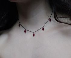 Artemis Dreaming. Βeauty and magic in the most delicately dark way. This necklace is composed of black rhodium over 925 sterling silver delicate sparkling chain and 5 tiny burgundy agate drops. You can choose between these chain lengths: 15 / 16 / 17 / 18 inches Not sure which length to buy? We can add a 1 inch extender chain. Just write a note at checkout! ❈ We send all our items with registered mail. ❉ Due to the organic nature of stones, there might be a slight variation in colour, size and shape. ✺ All items come packaged in a quality velvet pouch ready for gift giving. ✽ If you want to make a special order, just contact us! Gothic Sterling Silver Necklaces For Parties, Gothic Dangle Necklaces As Gifts, Gothic Dangle Necklaces For Gifts, Gothic Dangle Necklace For Gift, Witchy Choker Necklace Gift, Gothic Dangle Necklaces For Parties, Gothic Sterling Silver Choker Necklace, Dainty Drop Necklaces For Party, Handmade Witchy Necklace For Party