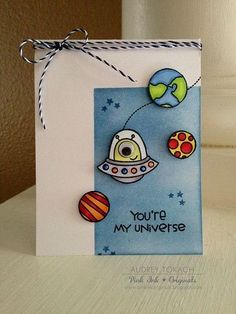 a card with an image of a space ship and planets on it that says, you're my universe