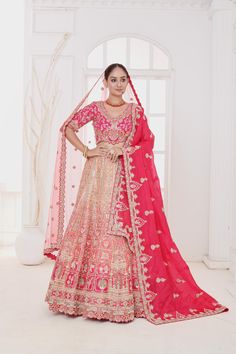 Item: Lehenga Set (Lehenga Skirt, Blouse, and 2 Dupattas) Experience the epitome of luxury with our Luxurious Dahlia Lehenga Set. Crafted using age-old hand embroidery techniques, this ensemble exudes sophistication and grace. Each thread is woven with care, resulting in a stunning masterpiece that is sure to turn heads wherever you go. Set in shades of peach to pink, this ombre beauty comes with double dupattas for drapery. The primary dupatta is made in organza while the lehenga and blouse are Lehenga And Blouse, Raw Silk Lehenga, Special Occasion Gowns, Skirt Blouse, Shades Of Peach, Lehenga Skirt, Saree Blouses, Silk Lehenga, Lehenga Designs