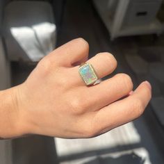 Staring down into this newly-crafted signet ring is akin to staring down into a portrait of the ocean! The opal is flanked by diamonds on the shoulder, the ring is low on the finger. with the rich 18kt yellow gold contrasting beautifully in color. And the bonus? It slips on like butter on the finger. 18kt yellow gold Size 6.5 & fully resizable Diamonds are estimated to be G/H colors & VVS/VS1 clarities. GIA Standards Please see qualitative report for more information. Video Below Iridescent Opal Ring With Gemstone, Iridescent Opal Jewelry For Anniversary, Luxury Opal Ring For Gift, Luxury Silver Opal Ring, Iridescent Opal Cabochon Ring For Anniversary, Modern Mens Rings, Art Jewelry Earrings, Diamond Signet Ring, All Band