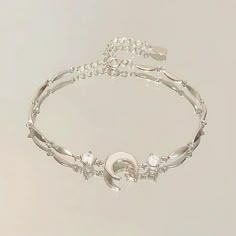 Description: Material: alloy Size:onesize Color:as picture 1. A bow symbolizes love, sweetness, and romance, while also conveying a feminine softness and elegance. 2. This bracelet features a slender chain with a cherry blossom shaped pendant embedded in the middle, which not only serves as decoration but also enhances the overall visual appeal of the bracelet. 3. Suitable for daily casual attire, it can also add a touch of warmth and romance in special occasions such as dates, parties, celebrat Feminine Softness, Crystal Flowers, Bow Bracelet, Spring Clothing, Gold Bead Bracelets, Pink Dresses, Silver Chain Bracelet, Silver Charm Bracelet, Hand Jewelry