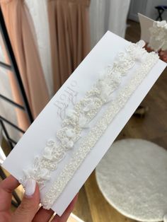 An elegant bridal garter, a thoughtful gift from bridesmaids. Complete the bride's ensemble with this beautiful accessory. #BridalGarter #WeddingGift #Bridesmaids Garter For Wedding, Pearls And Lace, Delicate Wedding, Bride Bachelorette, Pearl And Lace