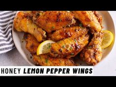 honey lemon pepper wings on a white plate