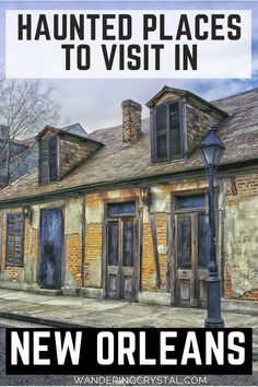 an old brick building with the words new orleans painted on it's front and side