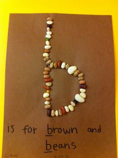 a piece of brown paper with rocks on it and the words is for brown and beans