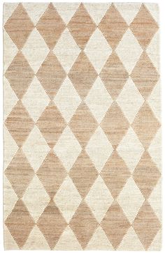 a beige and white rug with diamond shapes on the bottom, it is made out of wool