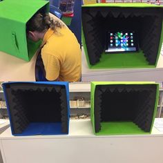 a woman is working on some kind of display case in a store or office area