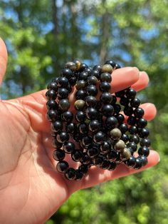 A Golden Obsidian Bracelet is the perfect adornment for those seeking to access the unique energy of this semi-precious gemstone. The golden-hued Obsidian is known to bring forth wisdom, strength, and healing. Wearing one of these bracelets can provide protection as well as an energy boost. Golden Obsidian, Overcoming Challenges, Obsidian Bracelet, Energy Boost, Emotional Healing, Shine Bright, Semi Precious Gemstones, Semi Precious, Jewelry Bracelets