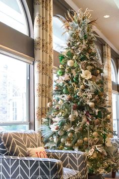 a decorated christmas tree in a living room