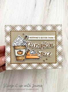 someone holding up a card that says nothing's better than pumpkin spice