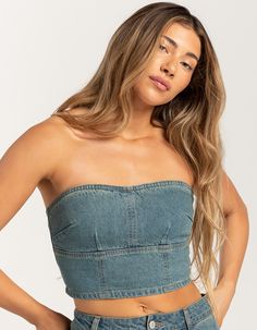 Rsq Denim Tube Top. Crafted From Soft And Durable Denim Fabric, This Tube Top Offers Both Comfort And Style. The Strapless Design Provides A Sleek And Flattering Silhouette, Perfect For Warm Weather Days Or Layering Under Jackets And Cardigans. Zipper Closure At Back. Cropped Fit. 100% Cotton. Machine Wash. Imported. Model Is Wearing A Size Medium. Model Measurements:height: 5'7" Bust: 34.5"waist: 27"hips: 38" Trendy Washed Denim Top, Trendy Washed Denim Blue Top, Denim Blue Strapless Crop Top For Spring, Strapless Denim Blue Crop Top For Spring, Strapless Denim Tops For Summer, Summer Strapless Denim Top, Blue Strapless Denim Vest, Casual Strapless Denim Blue Top, Strapless Denim Crop Top For Spring