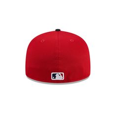 a red and black baseball cap with the logo on it's peak, in front of a white background