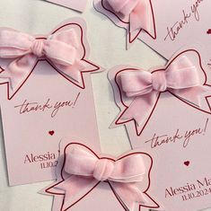 three pink bows with thank you notes on them for someone's special day or wedding