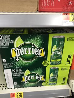 a display in a grocery store filled with perrier lemonade