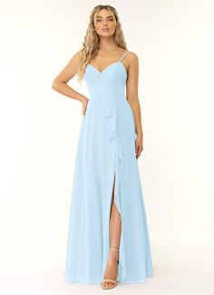 a woman wearing a light blue bridesmaid dress with a slit down the side