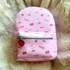 Nwt! Hot Topic Strawberry Milk Mini Backpack. Strawberry And Milk Carton Print. Front Zipper Pocket Has A Cute Strawberry Charm. Adjustable Straps. Interior Drop Pocket. Size: 8 1/2 X 4 X 11 1/4 Cute Softback Bag With Zipper Closure, Everyday Kawaii Backpack With Zipper Closure, Everyday Kawaii Backpack With Zipper, Cute Shoulder Backpack With Zipper Closure, Cute Satchel Backpack With Zipper, Cute Satchel Backpack With Zipper Closure, Cute Everyday Standard Backpack, Cute Backpack With Removable Pouch For Daily Use, Cute Everyday Backpack With Adjustable Strap