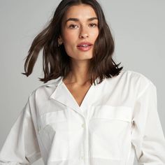 The Fay Utility Camp Shirt is roomy and relaxed but decidedly feminine and sophisticated. Crafted from cotton lawn, a lightweight yet durable fine thread poplin, the Faye has a silky-smooth hand feel. Its unique features include a lay-flat camp collar with an elevated top button and loop closure, wide-set center front Daywear Blouse With Camp Collar, Cotton Camp Collar Blouse For Work, Cotton Blouse With Camp Collar For Work, Relaxed Fit Shirt With Collared Neckline For Daywear, Modern Collared Blouse For Daywear, Modern Blouse With Spread Collar For Daywear, Relaxed Fit Camp Collar Blouse For Work, Daywear Shirt With Placket And Camp Collar, Relaxed Fit Collared Blouse For Daywear