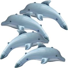 four dolphins are swimming in the water