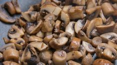 a pile of mushrooms sitting on top of a pan