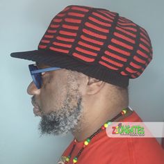 Experience the ultimate in comfort and style with this Small Black Red Rasta Dreadlocks cap. Expertly crafted from 100% cotton, this knitted hat not only keeps your dreadlocks covered, but also showcases your passion for the vibrant Rastafari culture. With its bold red and black colors and iconic Bob Marley design, this cap is the perfect addition to any reggae lover's wardrobe. Add it to your collection today and show the world your love for Rasta fashion! Size: ONE SIZE - SMALL Black Red RH039 Bob Marley, Hat Making, Black N Yellow, Knitted Hats, Black And Red, Crown, Dreadlocks, Hats, Red