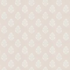 a white flower pattern on a light pink background