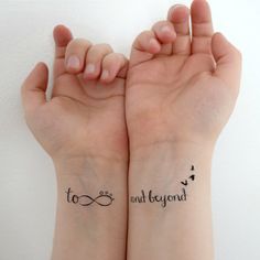 two wrist tattoos with the words to and beyond written on each one side of their arms