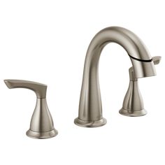 a brushed steel faucet with two handles