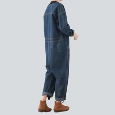 Introducing our dark wash. baggy denim overalls from the 2023 Autumn Collection ââ‚?the perfect mix of street style and sophistication!Why You Need It In Your WardrobeThese overalls are designed to embody the spirit of rebellion. being the ultimate balance between contemporary fashion and nostalgic street style. Crafted with a distinctive distressed pattern and baggy fit. they'll bring an edgy and effortless look to your wardrobe.Distinctive Features: Street Style: Inspired by the iconic street Baggy Denim Jumpsuit With Pockets For Fall, Utility Style Washed Denim Jumpsuit With Relaxed Fit, Fall Utility Overall Jeans, Fall Utility Overalls Jeans, Baggy Denim Blue Jeans Overall, Dark Wash Relaxed Fit Overalls, Baggy Overalls For Fall, Baggy Fall Overalls, Dark Wash Relaxed Fit Jeans Overall