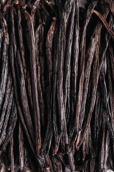 some brown sticks are stacked together on a table