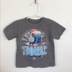 Thomas The Train Fans? I Took The Tags Off And Washed This, But My Kid Grew Out Of It Before He Wore It! It's Super-Soft And The Graphic Is Made To Look Worn, But It's Brand New. Gray Cotton Top With Cartoon Print, Soft-washed Crew Neck Tops For Playtime, Gray Cotton Tops With Character Print, Gray Cotton Tops For Playtime, Casual Gray Tops For Playtime, Friends Shirts, Friends Vintage, Thomas The Train, Thomas And Friends