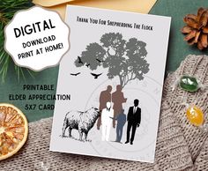 a card with an image of two people and a sheep on it next to some fruit