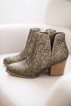 NOTHING quite says 'I'm here for the party' like a pair of glitter booties. Rubber heel and sole. 3 inch heel Fit true to size, if you are in between sizes, go with your larger size. If your foot is wide at all, also size up. Glitter Boots, Waterproof Jewelry, 3 Inch Heels, Shoe Fits, Wedding Dreams, Denim Leggings, Work Clothes, Rubber Heels, Hat Hairstyles