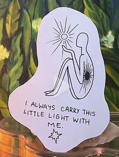 there is a sticker that says i always carry this little light with me on it